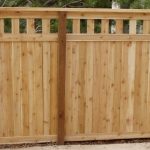 Custom fence providing privacy and security for residences